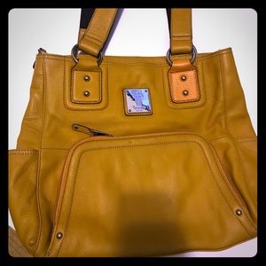 Tignanello yellow leather purse